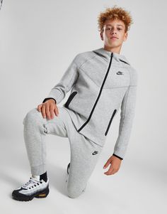 Cop a street essential with this juniors' Tech Fleece Full Zip Hoodie from Nike. Landing in a Grey colourway, this standard-fit hoodie is made with Nike's super-soft and warm Tech Fleece fabric for max' comfort. It features full zip fastening so you can switch up your style, stretchy ribbed trims to hold the shape, and zippered pockets for essential storage. Signed off with the Futura logo to the chest. Machine washable. Grey Nike Tech Fleece, Grey Nike Tech, Nike Tech Fleece Hoodie, Nike Uptempo, Nmd Adidas, Full Tracksuit, Tech Fleece Hoodie, Plus Size Joggers, Nike Sweats