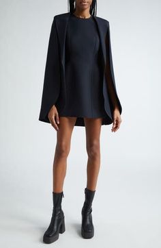 A drapey cape design—a Stella McCartney signature—highlights the lean silhouette of this minimalist dress tailored of wool-rich crepe. 36" length (size 46IT) Hidden back-zip closure Jewel neck Unlined Long cape sleeves 60% viscose, 40% wool Dry clean Imported Designer Clothing Minimalist Dress, Cape Designs, Long Cape, Minimalist Dresses, Cape Sleeves, Cape Dress, Jewel Neck, Fashion Sewing, Nordstrom Dresses