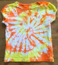 - Girls Tie Dye T-shirt, summer top, spring clothes, boho children - UK size 4-5 years  - Yellow and Orange - 100% Cotton - Handmade in the UK - Pre-washed - Only one available Spring Festival Hippie T-shirt, Hippie Multicolor T-shirt For Spring, Fun Summer Festival T-shirt, Multicolor Bohemian T-shirt For Beach, Playful Orange Summer T-shirt, Multicolor Bohemian T-shirt For The Beach, Bohemian Multicolor T-shirt For Beach, Playful Orange Tops For Summer, Playful Orange Summer Tops