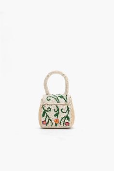 Embrace the joy of everyday adventures with our Little Flower Fun Mini Bag—an enchanting accessory designed to infuse your style with a burst of playful elegance. This mini bag is a celebration of floral charm, offering a delightful combination of whimsy and sophistication. Mini Clutch Magnetic Flap Closure Fully Beaded Front and Back Round Beaded Handle Made in Cotton Size : 3.5" x 3" x 2.5" Rectangular Travel Bags With Pearl Handle, Rectangular Travel Bag With Pearl Handle, Spring Rectangular Bag With Pearl Handle, White Travel Bag With Pearl Handle, Spring Handheld Bag With Pearl Handle, Spring Tote Bag With Pearl Handle, Handheld Bags With Pearl Handle For Spring, Spring Shoulder Bag With Pearl Handle For Daily Use, Pearl Handle Shoulder Bag For Daily Use In Spring