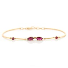 Gorgeous Burmese rubies have been selected for this stunning bangle bracelet. Dazzling pigeon blood red rubies gently dances across your wrists. These gorgeous gems give movement on top of your wrist. The design of this wonderful bracelet allows for the gemstones to always stay on top of the wrist. Each time you look d Burmese Ruby, Ruby Bracelet, Colored Gems, Blood Red, Unique Engagement, Gems Jewelry, Burmese, Chain Ring, Pigeon