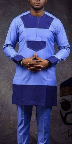 This Simple and classy will fit into any occasion or gathering like magic. Easy and comfortable. Its made with the concept of portraying African culture, talents and African prints....Its specially made for you to standout among crowds, You have to try one on to know how it really feels like .... Formal Blue Long Sleeve Agbada, Blue Kurta With Stand Collar, Fitted Blue Long Sleeve Thobe, Suits Groomsmen, African Male Suits, Sky Blue Shirt, Mens Traditional Wear, Dashiki Outfit, Dashiki For Men