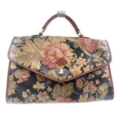 Vintage I Santi Luxurious Italian Tooled Floral Leather Doctor's Bag Satchel Handbag Made in Italy measurements: height: 9 inches length: 14 inches One of a kind vintage bag, floral leather details, the bag is lined with brown faux leather, one interior zipped pocket Bag is in good pre loved condition, one small crease on the flap please see pictures We had the bag professionally cleaned, leather polished and it is ready to be enjoyed Bargain at this price Vintage Brown Bags With Hasp Closure, Vintage Brown Bag With Hasp Closure, Vintage Satchel Shoulder Bag For Travel, Vintage Shoulder Bag With Detachable Handle For Everyday, Vintage Shoulder Bag With Hasp Closure, Vintage Brown Shoulder Bag With Hasp Closure, Vintage Shoulder Bag With Hasp Closure For Daily Use, Vintage Bags With Hasp Closure, Vintage Top Handle Bag With Hasp Closure