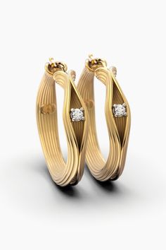 Fine Jewelry Single Diamond Hoop, Fine Jewelry Gold Huggie Earrings With Single Diamond, Modern Gold Huggie Diamond Earrings, Gold Huggie Earrings With Single Diamond, Modern Tarnish Resistant Diamond Earrings For Anniversary, Modern Tarnish-resistant Diamond Earrings For Anniversary, Modern Gold Diamond Hoop Earrings, Luxury Hoop Earrings With Single Diamond As Gift, Modern Gold Diamond Earrings For Anniversary