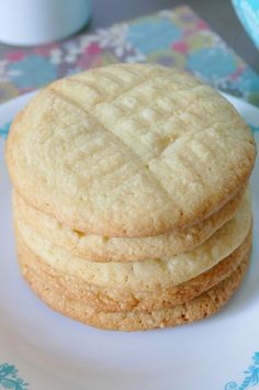 three cookies stacked on top of each other on a plate