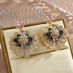 ✦ Explore the allure of bohemian style with our captivating drop earrings, featuring a unique fan-shaped flower design that adds a touch of exotic charm to your vacation ensemble. Crafted for the free-spirited souls, these earrings evoke a sense of wanderlust and adventure. The vibrant and intricate detailing of the floral motif embodies the essence of bohemian aesthetics, ensuring you stand out with a carefree and eclectic vibe. The drop silhouette introduces a graceful movement, making these e Elegant Flower Shaped Jewelry For Summer, Elegant Multicolor Flower Earrings, Elegant Summer Flower-shaped Jewelry, Flower Shaped Chandelier Earrings, Elegant Flower Earrings For Beach, Elegant Flower Shaped Earrings For Beach, Elegant Flower-shaped Beach Earrings, Elegant Dangle Flower Earrings For Beach, Elegant Flower-shaped Earrings For Beach