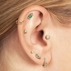 A beautiful flat back stud earring to add to your cartilage. With a modern design, this unique stud is crafted from 14k solid gold and bezel set with a marquise-cut emerald. It's minimalist and totally chic. You'll love wearing it!  The threaded screw pin earring post is easy to insert and remove, and the flat back makes it comfortable to wear. Our screw pin flat back earring studs are made of solid 14k gold and are hypoallergenic and nickel free. Materials: * 14k solid gold  * Genuine or lab gr Elegant Tiny 14k Gold Piercings, Modern 14k Yellow Gold Piercings, Modern Gold Internally Threaded Cartilage Earrings, Tiny Elegant Yellow Gold Piercings, Elegant Internally Threaded Huggie Cartilage Earrings, 14k Gold Internally Threaded Cartilage Earrings, Daith Jewelry, Tragus Hoop, Helix Jewelry