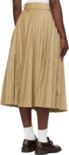 Find SACAI Beige Cotton Gabardine Midi Skirt on Editorialist. Cotton-blend gabardine midi skirt. Knife pleats throughout. · Wrap construction · Integrated pin-buckle belt at waistband · Button closure · D-rings at waist · Flap pockets at front · Unlined Supplier color: Beige