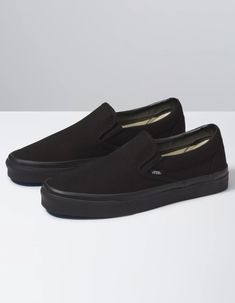 Vans Classic Slip-On shoes. The Canvas Classic Slip-on has a low profile, slip-on canvas upper with elastic side accents, Vans flag label and Vans original Waffle Outsole. Imported. Vans Original, Vans Classic Slip On, Vans Classic, Slip On Shoes, Low Profile, Black Shoes, Loafers, Slip On, Flag