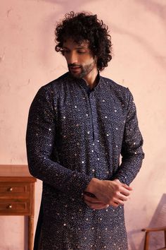 SHRESTHA By VASTRAMAY Men's Navy Blue Georgette Zari With Sequins Worked Kurta Patiala Set This elegant navy blue kurta Patiala set by VASTRAMAY is designed for the modern man. Made from high-quality georgette with intricate zari and sequin work, it offers both comfort and style for any festive occasion. Features Navy blue color Georgette fabric Zari and sequins work Traditional Patiala design Comfortable fit Specifications Brand: VASTRAMAY Color: Navy Blue Material: Georgette Work: Zari and seq Fitted Indigo Kurta With Long Sleeves, Indigo Long Sleeve Fitted Kurta, Fitted Indigo Long Sleeve Kurta, Fitted Blue Kurta For Summer, Patiala Design, Navy Blue Kurta, Blue Kurta, Georgette Fabric, Sleeveless Jacket