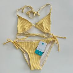 Snapper Rock Marigold Stripe Girls 2pc Bikini Have Fun In The Sun! Upf50+ Sun Protection Adjustable Shoulder And Back Straps Ties On The Swim Bottom Are For Decoration Only, Can Not Be Adjusted Playful Yellow Swimwear For Swimming, Adjustable Yellow Swimwear For Vacation, Adjustable Yellow Swimwear For The Pool, Playful Yellow Swimwear For Sunbathing, Playful Yellow Swimwear For Spring, Playful Yellow Swimwear For Beach Season, Playful Yellow Swimwear For Vacation, Fun In The Sun, Kids Swimming