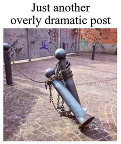 a metal pole with chains attached to it and the caption just another overly dramatic post