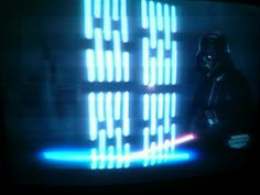 a darth vader star wars on the television screen