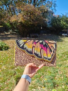 "Colorful Leaf-Shaped Beaded Clutch Purse | Artisan Handcrafted | Summer Festival Crossbody Bag | Unique Gift for Her.\" Discover the perfect blend of artistry and functionality with our handcrafted beaded clutch purse. Designed with a unique leaf-shaped top, this purse is not just an accessory; it is a statement piece that stands out in any crowd. Ideal for summer festivals, concerts, or a night. Out, it offers a stylish way to carry your essentials. Step out in style with our stunning handmade beaded clutch purses, the perfect accessory to add a splash of color and a modern flair to any ensemble. These eye-catching bags feature intricate hand-beaded designs that seamlessly blend contemporary chic with classic elegance, making them versatile for both modern and traditional outfits. Length Festival Bags With Multicolor Embroidery And Beaded Details, Festival Bags With Multicolor Embroidery And Beads, Festival Beaded Bags With Multicolor Embroidery, Festival Multicolor Embroidered Beaded Bags, Party Bags With Multicolor Embroidery And Beaded Details, Traditional Multicolor Beaded Clutch, Summer Beaded Clutch As Gift, Summer Beach Beaded Clutch, Summer Multicolor Embroidered Clutch