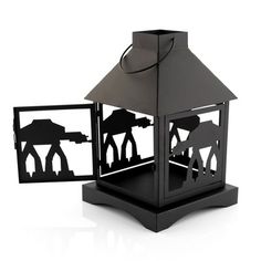 a black lantern with star wars silhouettes on the front and sides, set against a white background