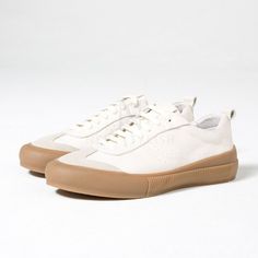 Modern Custom Lace-up Sneakers With Textured Sole, Sporty Lace-up Canvas Shoes With Gum Sole, Casual Lace-up High-top Sneakers With Gum Sole, Sporty Lace-up Skate Shoes With Rubber Sole, Casual Low-top Walking Shoes With Laces, Modern Leather Lace-up Running Shoes, Casual Cream Lace-up Shoes With Round Toe, Sporty Lace-up Sneakers With Rubber Sole, Casual Leather Lace-up Shoes With Vulcanized Sole