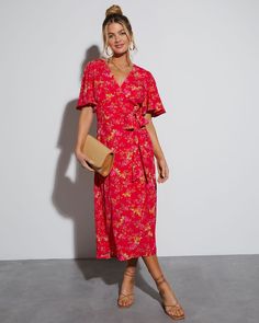 Look pretty and polished at your next celebratory event with this wrap maxi dress. It comes in a bold, beautiful hue with flowers all over and wraps at the front. We love that it has relaxed short sleeves, too! Style it with your favorite clutch and heels. Wrap dress Surplice neckline Short sleeves Floral print Self: 54% Rayon 46%Viscose, Lining: 90% Rayon 10% Spandex Red Floral Dress Outfit, Pretty And Polished, Floral Dress Outfits, Floral Wrap Maxi Dress, Wardrobe Goals, Spring Maxi Dress, Spring Celebration, Wrap Dresses, Red Dress Outfit