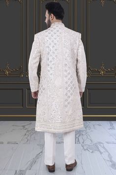 This men's sherwani, model M42-S125, features a stunning sequin floral design that is perfect for Grooms. Made with high-quality materials, this sherwani offers both style and comfort for your special day. Elevate your look and make a statement with this elegant and modern sherwani. Mens Sherwani, Elevate Your Look, Your Special, This Man, Special Day, Sequin, Floral Design, High Quality, Floral