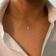 This Understated Beauty Initial Necklace is the perfect way to subtly stand out. With high-quality stones and craftsmanship, it provides a powerful sparkle that is sure to turn heads. Great for everyday shine or layering with other pieces, it's the ideal accessory for any occasion. Approximately 16" with a 2" extender 18k gold plated brass, cubic zirconia Lead and Nickel free Designed in US, crafted in China Necklace Initial, Hair Setting, Initial Pendant, Scrunchie Hairstyles, Steel Jewelry, Stainless Steel Jewelry, Headband Hairstyles, Hair Claw, Initial Necklace