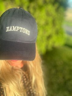 Look chic on the beach with this stylish "Hamptons" hat! The HAMPTONS New York logo embroidered on the front is perfect for a day of summer fun. One size fits most, so pack it up and show off your Hamptons style on vacation (or your backyard!). Summer Beach Dad Hat With Embroidered Logo, Summer Wide Brim Hat With Embroidered Logo, Summer Adjustable Baseball Cap With Embroidered Logo, Adjustable Summer Baseball Cap With Embroidered Logo, Brimmed Dad Hat For Summer Beach, Summer Vacation Hats With Embroidered Logo, Summer Hats With Embroidered Logo, Summer Brimmed Hat With Embroidered Logo, Hamptons New York