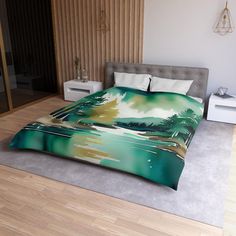 a bed with a green and yellow painting on it