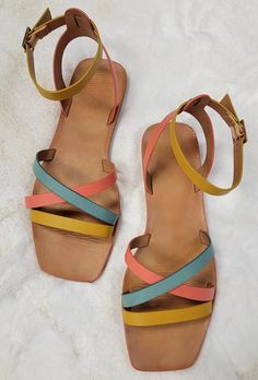 Multi colored strappy flat sandals Features coral, mango and teal colored straps including comfortable ankle straps Perfect Summer sandals to coordinate with many outfits Multicolor Strap Sandals For Spring, Multicolor Strappy Sandals For Spring, Green Sandals With Adjustable Straps For Summer, Summer Orange Ankle Strap Sandals, Orange Ankle Strap Sandals For Summer, Green Double Strap Sandals For Summer, Multicolor Summer Sandals With Adjustable Strap, Multicolor Open Toe Sandals With Adjustable Strap, Strappy Flat Sandals