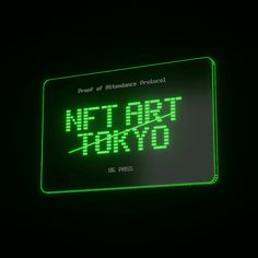 a green neon sign that says net art tokyo in japanese writing on the side of it