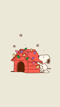 snoopy and his doghouse with stars on the roof, in front of him