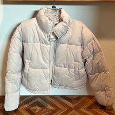 H&M Puffer Jacket Size M New With Tags Beige Puffer Jacket With Padded Collar For Spring, H&m Outerwear For Cold Weather In Fall, Spring Beige Puffer Jacket For Outdoor, Trendy H&m Winter Outerwear, H&m Winter Outerwear For Cold Weather, H&m Outerwear For Cold Weather And Winter, H&m Winter Outerwear In Neutral Color, H&m Winter Outerwear, H&m Beige Outerwear For Spring