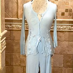 Beautiful Deadstock Vintage Roberta Lassi Baby Blue Stretchy Woven Cotton Two Piece Pajama Set. Button Down Top. Elastic Waist Pants. Tags Still Attached. Fits A Us Small. Gtd/Cg Blue Sets For Relaxation In Spring, Fitted Lace Trim Loungewear Set, Elegant Light Blue Sleepwear For Loungewear, Fitted Light Blue Loungewear Sets, Light Blue Fitted Loungewear Sets, Fitted Blue Sleepwear For Loungewear, Light Blue Fitted Sleepwear For Spring, Two Piece Pajama Set, Vintage Loungewear