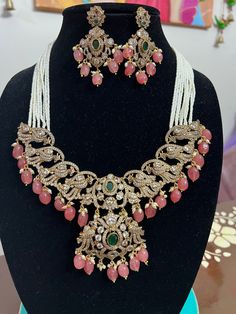 This is a beautiful necklace with high quality stone. Designer made necklace set can be worn for any occasion. Ships immediately. White Gemstone Necklace For Party, White Gemstone Party Necklace, Crystal Jeweled Necklaces For Celebration, Elegant Crystal Jewelry With Stone Work, Crystal Long Necklace Jewelry For Wedding, Costume Jewelry With Stones, Elegant Pink Round Kundan Necklace, Crystal Long Necklace For Wedding, Cubic Zirconia Costume Jewelry Necklace