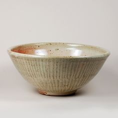 a white bowl sitting on top of a table