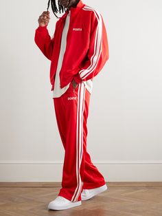 You'll often find references to vintage sportswear in SAINT Mxxxxxx's eclectic collections. These track pants are made from jersey that's striped down the sides and pressed with creases through the front. Wear yours with sneakers and the matching jacket. 90s Tracksuit Outfit, Tracksuit Outfit Mens, Track Suit Outfit, 90s Tracksuit, Tracksuit Outfit, Vintage Sportswear, Track Suit Men, Jersey Pants, Striped Jersey