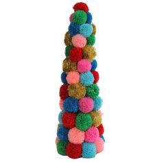 a multicolored pom - pom tree is shown against a white background