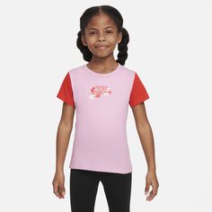 Kiddos can make moves in this soft tee, made of cotton/poly jersey in a classic cut with a tagless crewneck for a comfy feel. Sporty Pink T-shirt With Logo Print, Playful Pink T-shirt For Spring, Basic Pink Pre-shrunk T-shirt, Playful Pink Short Sleeve T-shirt, Nike Pre-shrunk Graphic Tee, Sporty Pink T-shirt With Screen Print, Playful Pink Tops With Letter Print, Spring Sports T-shirt Pre-shrunk, Playful Pink T-shirt For School