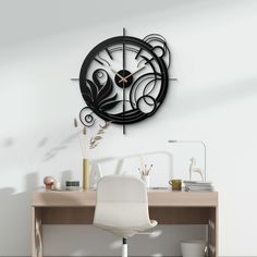 a black clock on the wall above a desk with a chair and plant in it