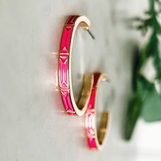 Enamel hoop earrings So fun! Pink Enamel Hoop Jewelry, Pink Enamel Hoop Earrings, Nickel-free Enamel Hoop Earrings, Pink Small Hoop Metal Earrings, Small Hoop Pink Metal Earrings, Pink Small Hoop Earrings In Metal, Small Hoop Enamel Earrings, Trendy Round Enamel Hoop Earrings, Stacked Earrings