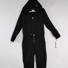 Calvin Klein New Women Hoodie Jumpsuit Jumper Pant Size L Adjustable Waist Black Stretch Relaxed Comfy Invbx009 Cuffed Pants, Drawstring And Elastic Waist, Full Zipper Front Closure, Comfort, Oversized. Calvin Klain Women's Loose Fit Causal Jumpsuit Overalls Jumpers Size L Side Pockets Pants Elastic Waist Perfect For Travel Approximate Measurements: - Shoulders 16" - Bust 21" Flat = 42" Across - Waist 18" Flat And 38" Across Elastic Waist, Stretch Material - Hips 25" Flat = 50" Across - In Seam Black Long Sleeve Athleisure Jumpsuits And Rompers, Athleisure Jumpsuits And Rompers With Pockets For Loungewear, Sporty Long Sleeve Jumpsuits And Rompers For Loungewear, Sporty Long Sleeve Jumpsuit For Loungewear, Casual Hooded Jumpsuits And Rompers For Winter, Casual Hooded Jumpsuits For Winter, Casual Hooded Jumpsuits For Fall, Sporty Loungewear Jumpsuits And Rompers For Fall, Sporty Fall Loungewear Jumpsuits And Rompers