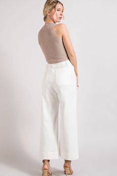 Get ready to upgrade your wardrobe with our Soft Washed Wide Leg Pants! These versatile pants feature a button closure and two front pockets for both style and function. The wide leg design offers a relaxed fit and can be worn with a belt for a tailored look. Add your favorite top and booties for a chic and comfy outfit that will keep you looking and feeling great all day.Model is 5'8" and wearing a small.Fabric Contents: 97% Cotton, 3% Spandex Care Instructions: Machine wash cold, gentle cycle, Modern White Cropped Leg Bottoms, White Cropped Leg Modern Bottoms, White Wide Leg Pants With Welt Pockets For Work, Modern White Wide Leg Pants For Work, White High-waisted Wide Leg Pants, Modern White High-waisted Wide Leg Pants, White Cotton Wide Leg Pants With Belt Loops, White Cropped Wide Leg Pants For Work, Chic Beige Cropped Wide Leg Pants