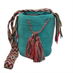 ★100% COTTON ★Our bags are sourced directly from the Wayu'u community in Guajira where each bag, depending on its complexity, can take up to 5 days to produce, 100% handmade by the women of the Wayuu tribe. ★Unique design in each bag, large capacity, you can comfortably store your laptop, iPad, phone, wallet, cosmetics, umbrella and other things. Perfect for use in office, school, dating, travel or any other daily occasions. ★With each purchase we help the Wayuu people to its development and evolution. ★Approximate dimensions: H: 8inch x W: 9inch x D: 7inch Straps: 16 - 20inch. Medium Size.It can be washed in a washing machine with a soft program and at a low temperature. Woven Pouch Bag For Travel, Woven Travel Pouch Bag, Eco-friendly Bucket Bag With Adjustable Strap, Artisan Bucket Shoulder Bag For Daily Use, Artisan Bucket Bag For Festival, Artisan Style Bucket Bag For Festivals, Artisan Bucket Bag For Market, Artisan Blue Pouch Bag, Artisan Festival Bucket Bag