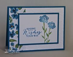 a card with blue flowers and the words sending wishes to your way on it's side