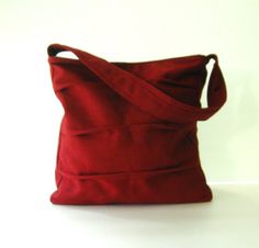 *** Please check 'shop announcement' for production time and delivery before your purchase. ***This gorgeous bag is made from deep red pure hemp material. I really love its unique texture and the ruggedness of hemp, giving you a different feeling from other kinds of fabric.This everyday bag is sturdy and roomy enough to hold your essentials, such as books, wallet, Ipad, mobile and keys. It's fully lined with canvas, there are 2 slip pockets, one zipper pocket  and a pen slip inside. The strap ha Eco-friendly Red Shoulder Bag For Shopping, Red Eco-friendly Canvas Shopping Bag, Eco-friendly Red Canvas Bag For Daily Use, Red Canvas Shoulder Bag For Gifts, Eco-friendly Red Tote Shoulder Bag, Red Cotton Shoulder Bag With Adjustable Strap, Red Shoulder Canvas Bag As Gift, Red Shoulder Canvas Bag For Gift, Red Canvas Shoulder Bag Gift