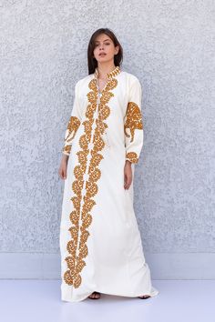 This stunning kaftan with its monotone embroidery will be your summer favorite. It is an extremely comfortable wear, light and soft and can be used on many occasions -  home gatherings, festival parties, summer occasions, dinners, or just in your home to feel comfortable. Fabric : 70% Egyptian Cotton; 30% Polyester. Kaftan measurements in inches : Medium (Size 8/10 USA) Bust : 39-40 Hip : 45-46  Large (Size 12/14 USA) Bust : 44-45 Hip : 50-51  XL (Size 16/18 USA) Bust : 47-48 Hip : 53-54  XXL (S Traditional Long Sleeve Maxi Dress With Resham Embroidery, Eid Maxi Dress With Intricate Embroidery, White V-neck Maxi Dress For Eid, Long Sleeve Resham Embroidered Kaftan For Eid, Festive White Kaftan With Gold Embroidery, White Floor-length Abaya, Festive Long Sleeve Maxi Dress With Chikankari Embroidery, Long Sleeve Kaftan With Gold Embroidery For Eid, Festive Long Sleeve Kaftan With Gold Embroidery