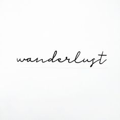 the word wanderlust written in cursive black ink on a white background