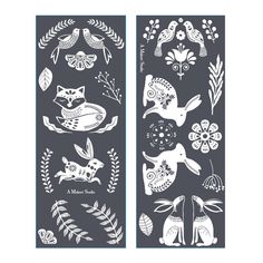 two bookmarks with animals and plants on them, one is black and the other is white