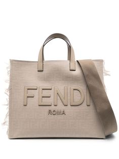 beige calf leather monogram jacquard signature embossed FF pattern fringed edge logo lettering two top handles open top main compartment internal zip-fastening pocket adjustable detachable shoulder strap Fendi Tote Bag, Fendi Men, Fringe Tote Bag, Edge Logo, Fendi Tote, Chanel 2, Iconic Bags, Jacquard Fabric, Shopper Bag