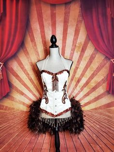 "*Please see measurements below Included in listing: Beaded Feathered corset costume top (Accessories not included) Costume available in the following sizes / Please measure your waist: Small Approximately: 32-33\" Bust, 24-25\" waist (Bra size 32A-32B) Medium Approximately: 34\" Bust, 26-27\" waist (Bra 34A-34B) Large Approximately: 36\" Bust, 28-29\" waist (Bra 34C-36C) XL Approximately: 36\" Bust, 30-32\" waist (36C/D) Waist measurement is most important *Not sure what size you need, let me k White Overbust Corset Dress For Costume, Vintage White Corset Dress For Costume Party, White Fitted Corset Dress For Costume Party, Strapless Corset Dress With Boned Bodice For Costume, White Fitted Costume Corset, White Gothic Corset Dress For Costume, Fitted White Corset For Costume, White Underbust Corset Dress For Costume Party, Fitted Corset For Dance At Halloween