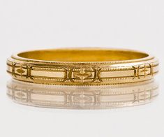 This gorgeous and crisp antique wedding band is just one of many unique bands we recently acquired through one mans personal collection over the past 100 years. As yellow gold was rarer to the time period than white gold or platinum, we have such an appreciation for the fineness and craftsmanship of these bands as they were never worn, only admired from afar. This ring is as magnificent today as the day it was handmade. Original 1920's Antique Wedding Band14k Rose GoldEtchedMarked "White Rose" R Antique Engraved Ring With Decorative Band, Victorian Engraved Ring With Decorative Band For Anniversary, Antique Engraved Ring With Decorative Band For Anniversary, Antique Engraved Ring With Decorative Band For Ceremonial, Antique Engraved Ring With Decorative Band For Ceremonial Occasions, Antique Ceremonial Engraved Ring With Decorative Band, Formal Vintage Engraved Ring With Decorative Band, Classic Yellow Gold Jewelry For Ceremonial Wedding, Gold Art Deco Engraved Wedding Ring