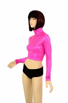 "This item is made to order, please read all the way through the listing before purchasing! Super shiny, sparkling holographic pink spandex. This crop top has a high turtle neckline and long sleeves, and a four way stretch fit. LENGTH: 8\" (from the underarm to the hemline) Womens Sizing (See below for instructions on where measurements should be taken) XXS: Bust 29\"-30\" / Waist 22\"-23\" / Hips 30\"-32\" Extra Small: Bust 31\"-32\" / Waist 24\"-25\" / Hips 33\"-35\" Small: Bust 33\"-34\" / Wa Stretch High Neck Crop Top For Party, Metallic Shiny Fitted Crop Top, Fitted Metallic Shiny Crop Top, Metallic Fitted Disco Crop Top, Metallic Fitted Long Sleeve Tops, Metallic Long Sleeve Club Tops, Metallic Long Sleeve Tops For Club, Spring Shiny Stretch Tops, Long Sleeve High Stretch Crop Top For Party