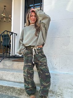 Model wears size small; runs true to size Designed in camo twill jogger pants, box pocket detailing, button & strap on waist. 100% cotton Camo Joggers Outfit Women, Camo Pants Outfit Women, Camo Joggers Outfit, Camp Pants Outfit, Camouflage Pants Outfit, Joggers Outfit Women, Green Cargo Pants Outfit, Parachute Pants Outfit, Camo Pants Outfit